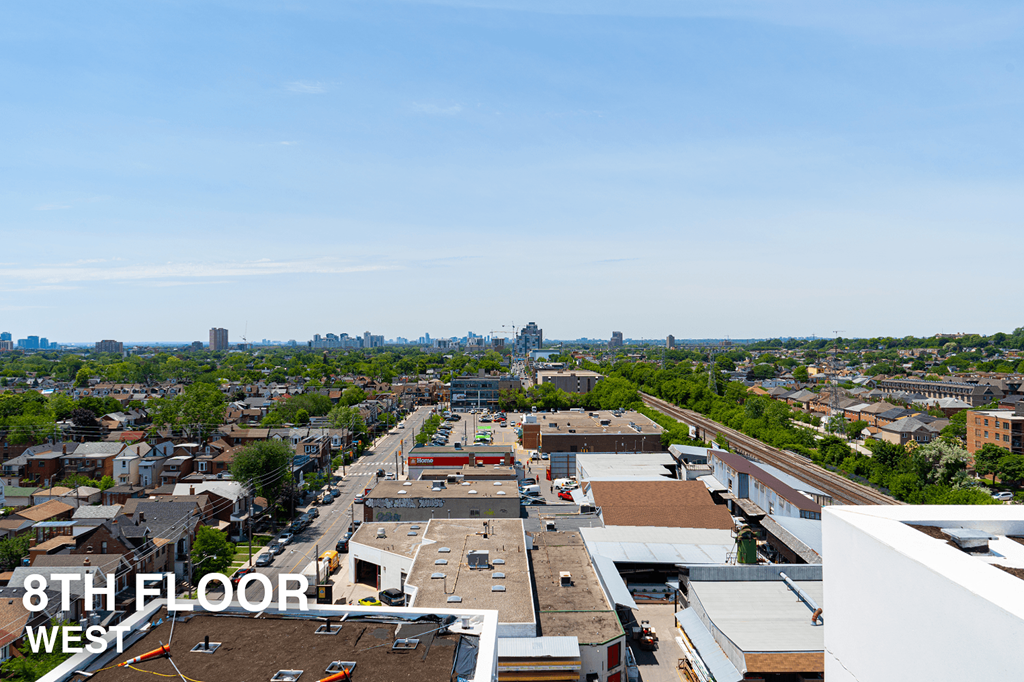 A view from the 8th floor west looking out over a city.