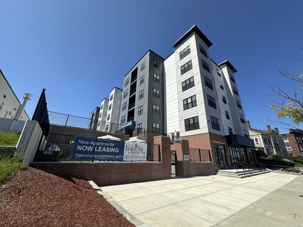 front of the building with now leasing sign