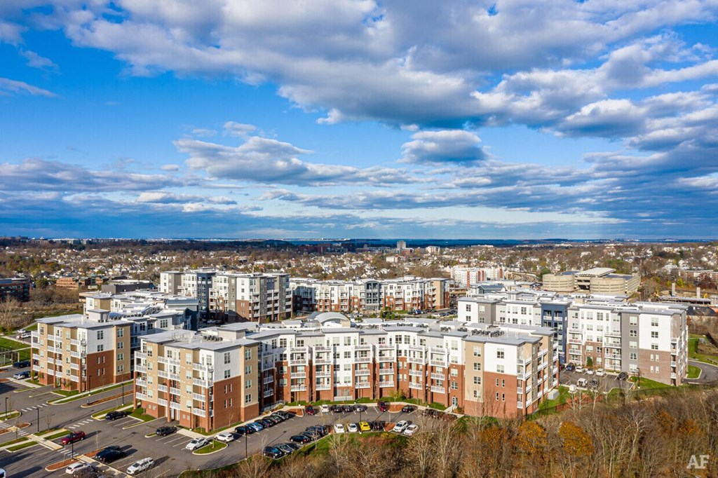 an aerial view of apartment buildings in a city