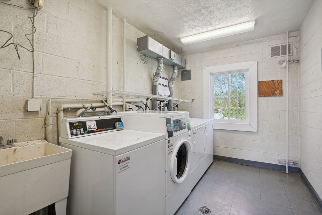A laundry room with a washer and dryer.