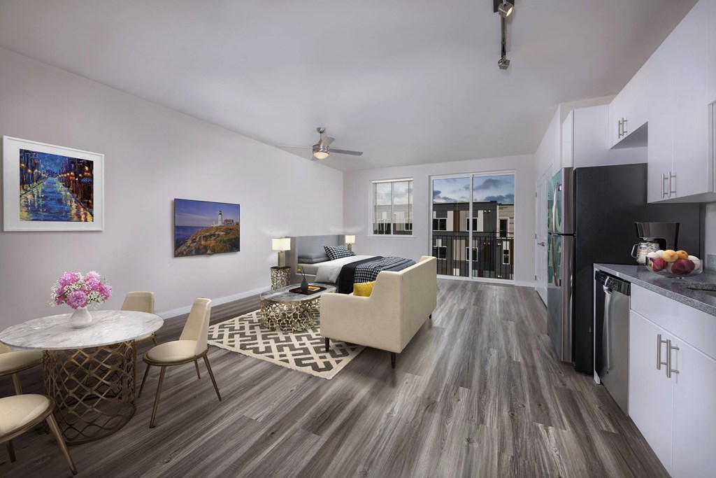 A modern kitchen with a dining table set up.