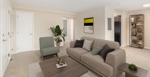 a living room with a couch and a chair