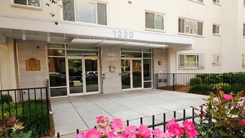 The front of a building with the number 1220 on it.