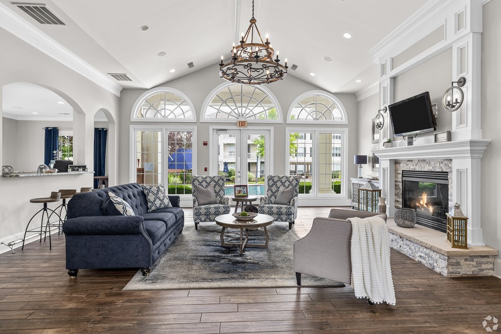 A living room with a fireplace and a couch.