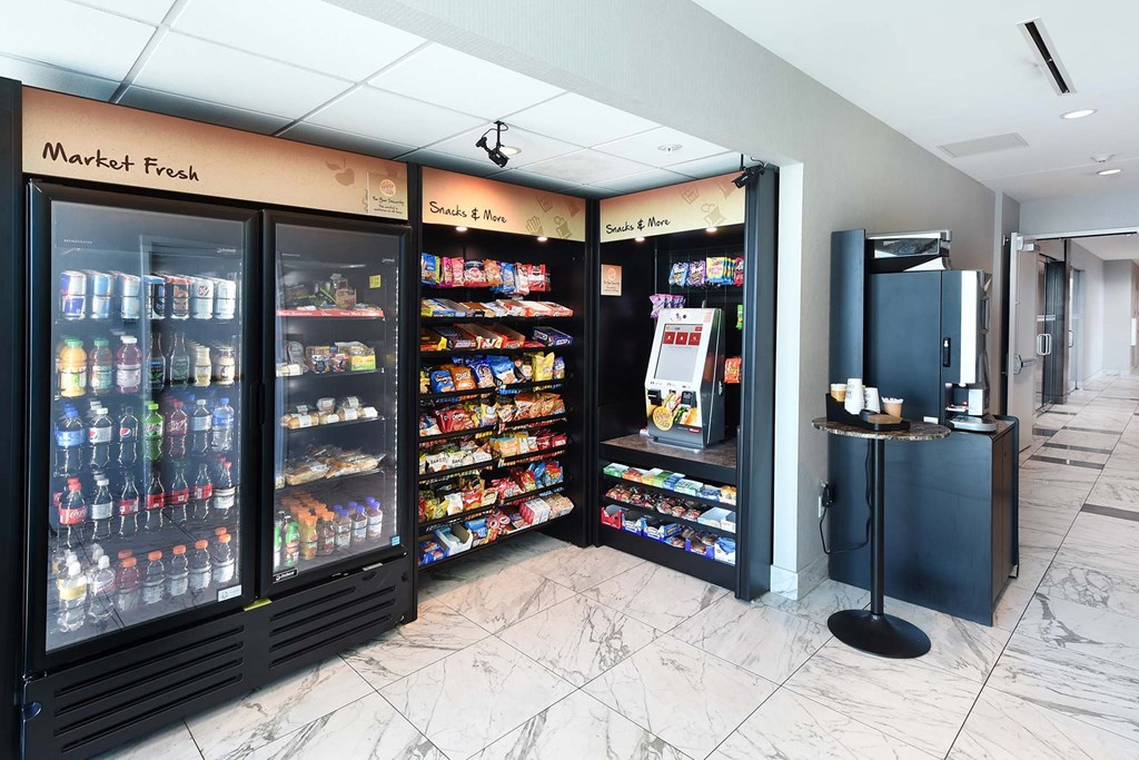 A market fresh section in a store with a variety of products at Two Twelve Clayton Apartments, Clayton, MO, 63105