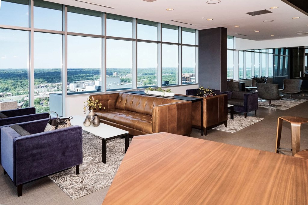 A modern living room with a view of the city at Two Twelve Clayton Apartments, Clayton 63105