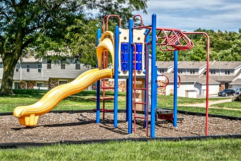 the playground at the preserve at danbury apartments with slides