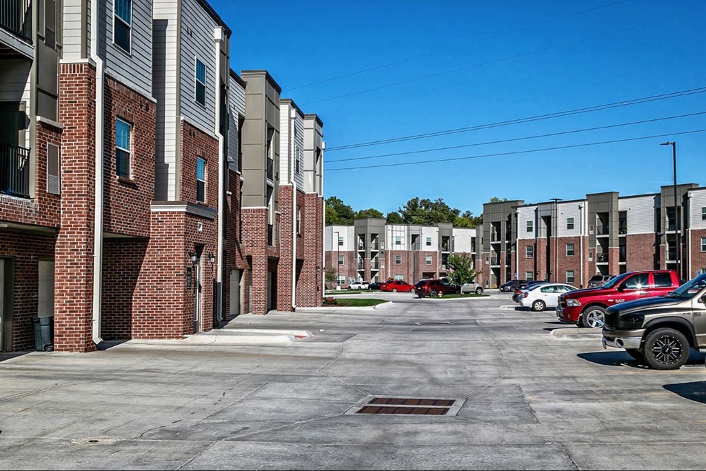 a city street with buildings and cars on it