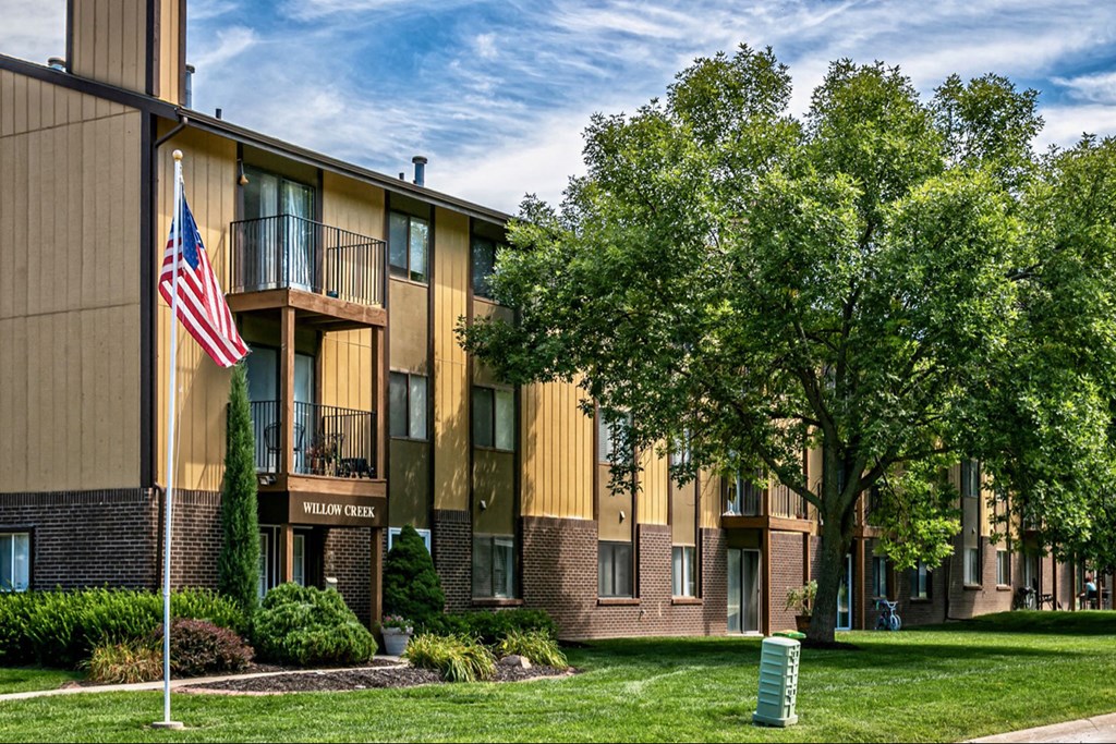 a building with an flag in front of it