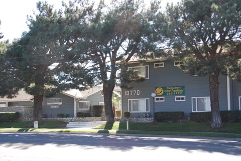 Apartment complex with a sign that says "10770" on it.