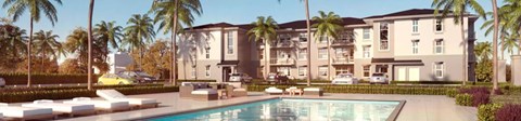 A large, modern building with a pool in front.