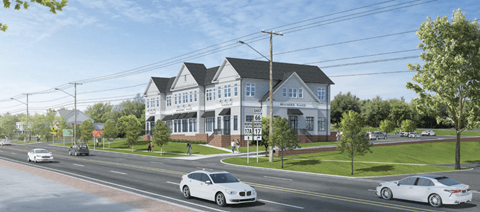 A white car is driving down a street past a house.