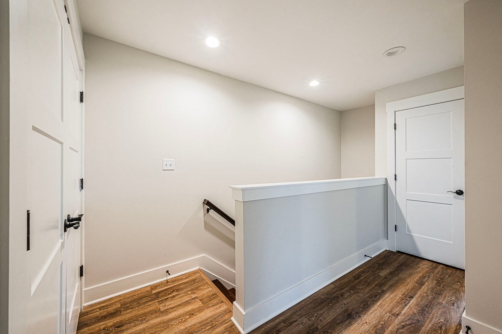 A white door is on the left side of the image.