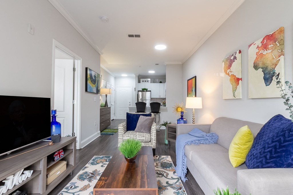 a living room with a couch and a tv