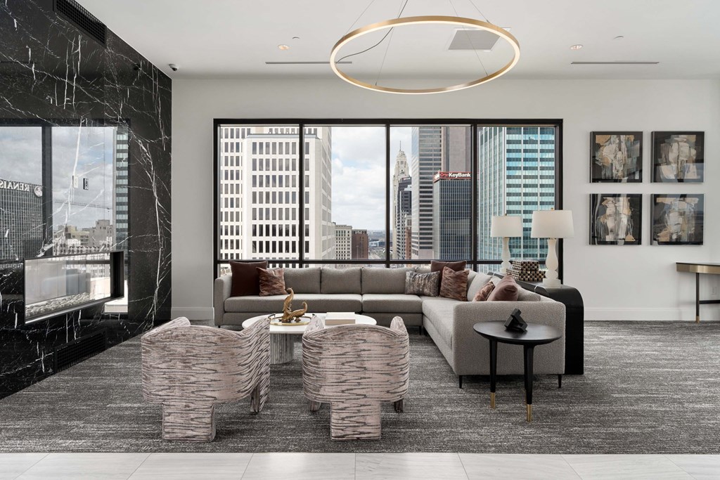 A modern living room with a view of the city.