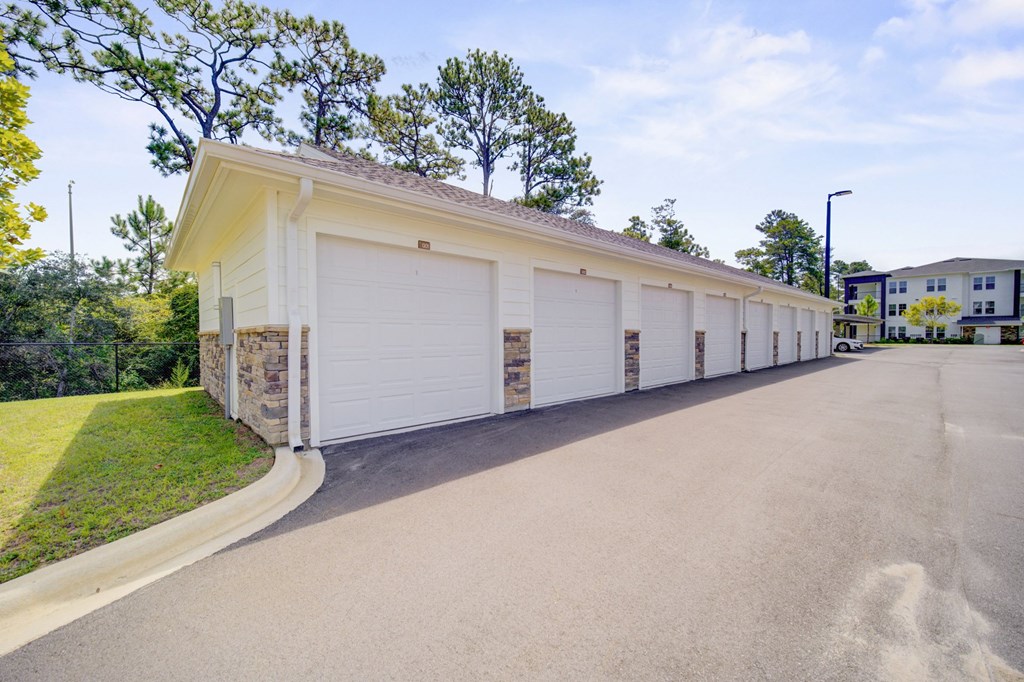 A row of garage doors are closed.