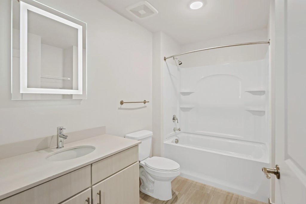a bathroom with a sink toilet and a showerat Metropolis Apartments, Virginia, 23060
