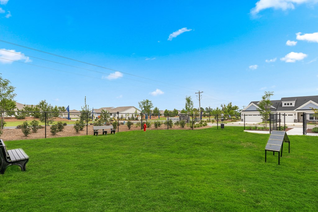 the preserve at ballantyne commons community park with benches and grass