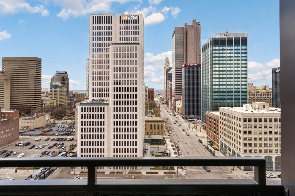 A cityscape with a Chase bank building in the center.