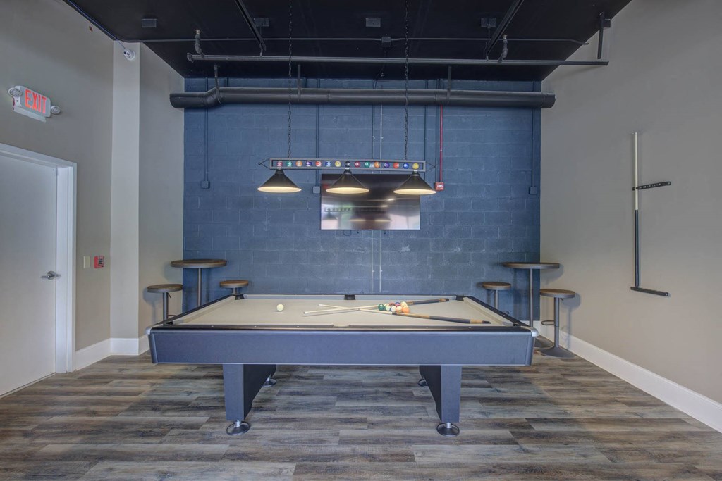 a blue pool table in a room