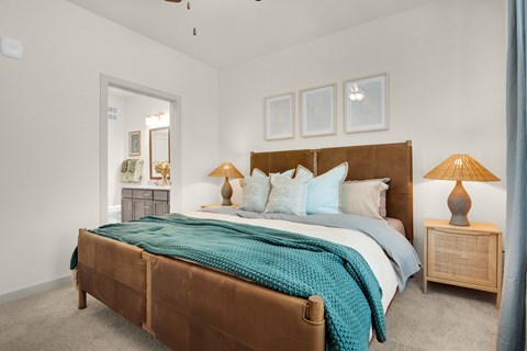 a bedroom with a large bed and a closet a bedroom with a large bed and a closet at The Enclave at Deer Moss Creek, Niceville, 32578