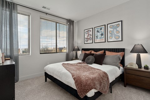 Bedroom with large comfortable bed at The Pembroke, Columbus