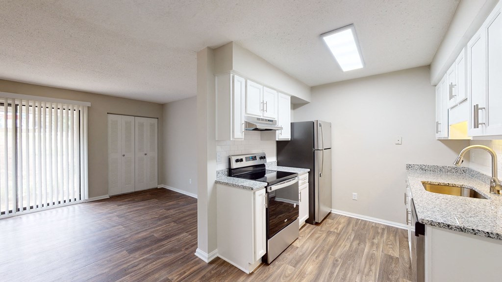 a kitchen and living room in a Lynnwood Park