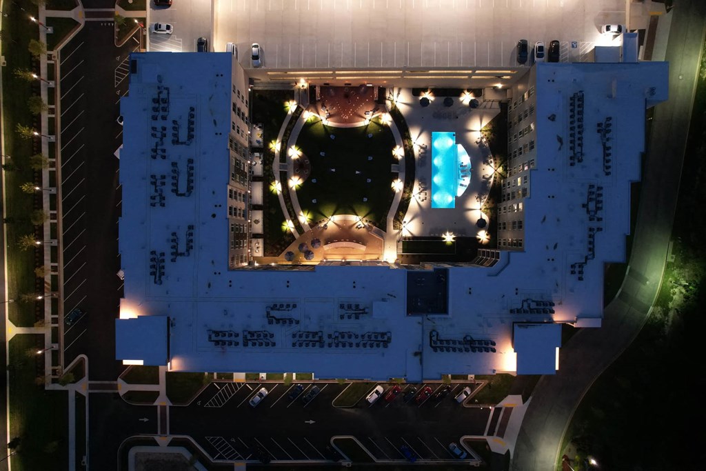 an aerial view of the roof of a building at nightat Metropolis Apartments, Virginia, 23060