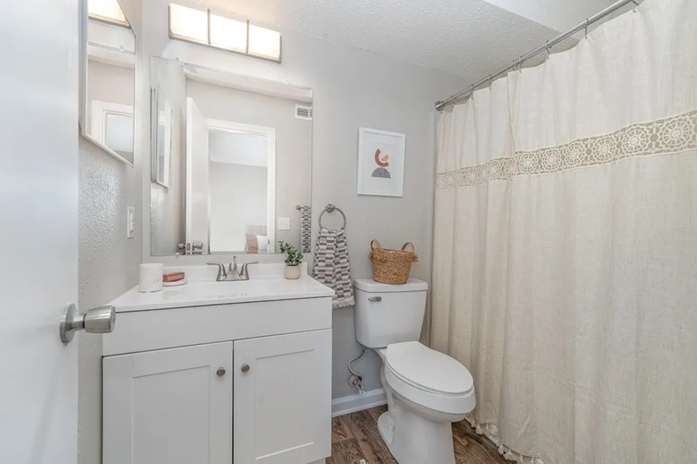 a bathroom with a sink toilet and a shower at Village 1373, Greensboro North Carolina