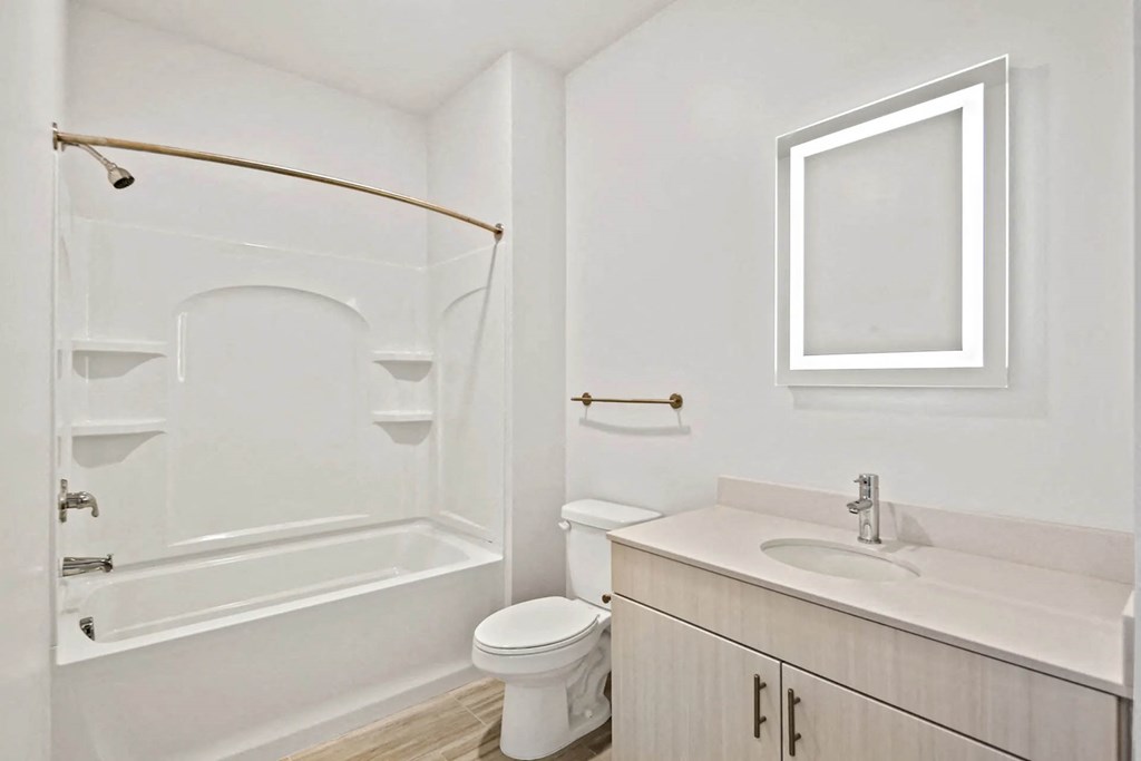 a bathroom with a sink toilet and a showerat Metropolis Apartments, Glen Allen, 23060