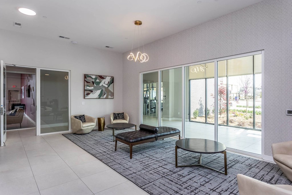 a living room with a couch and a tableat Centro at Pine Nash, North Carolina
