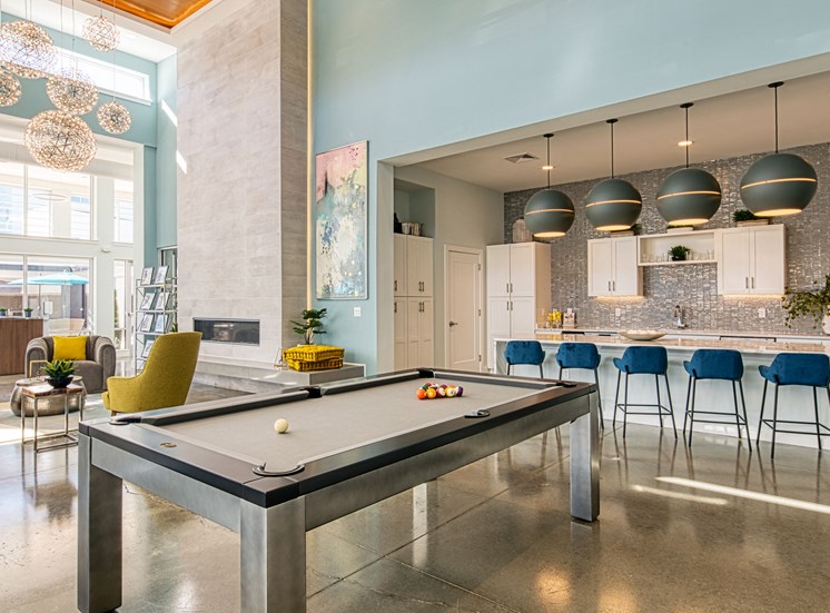 Club room and pool table at Lumen Apartments