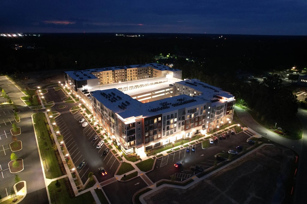 an aerial rendering of the hotel at nightat Metropolis Apartments, Glen Allen, VA