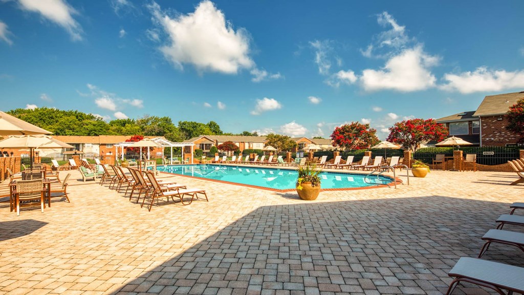 a swimming pool at the resort on a sunny day