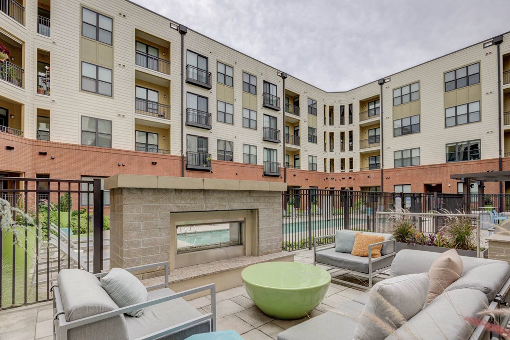 Outdoor Lounge With Fireplace at The Lincoln Apartments, North Carolina, 27601