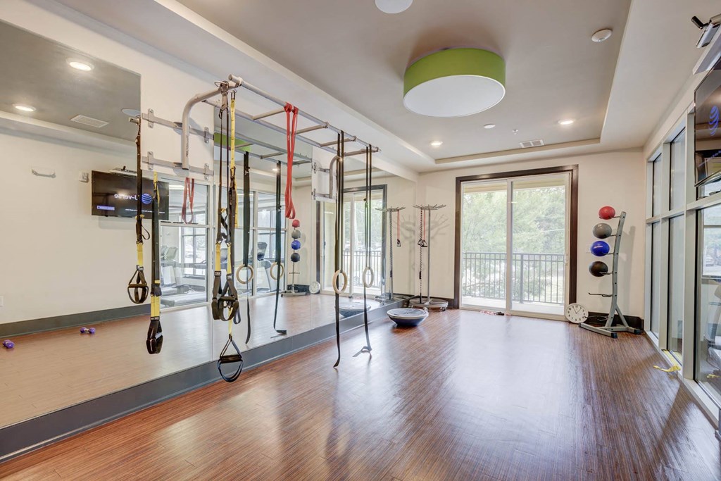 Fitness Center With Yoga/Stretch Area at The Lincoln Apartments, North Carolina