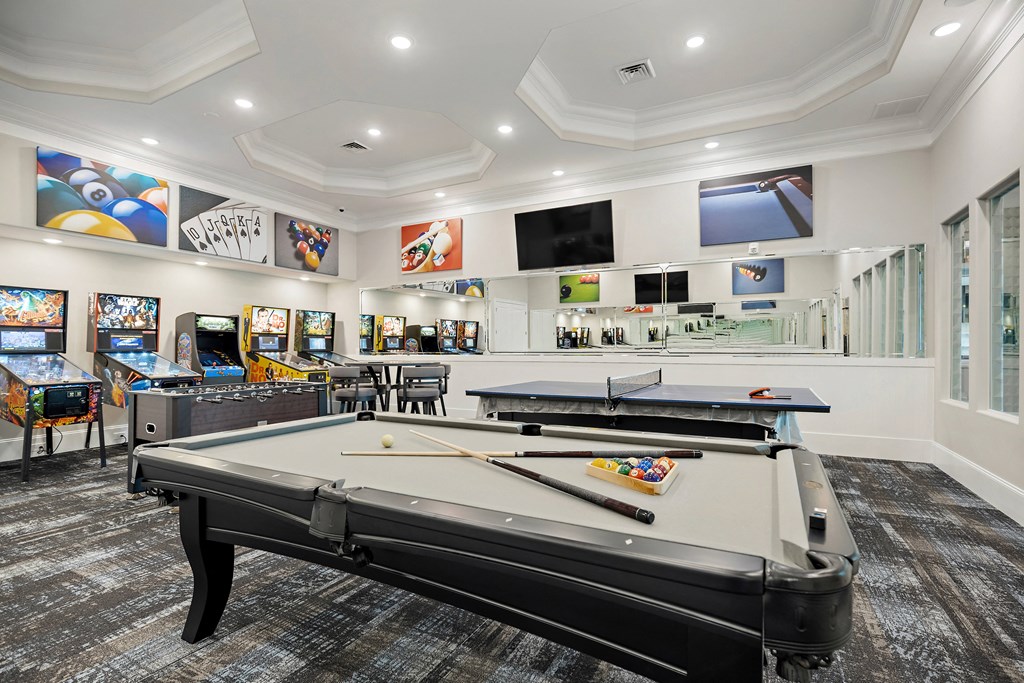 play a game of pool in our game room at our apartments at Ellis Station, Durham, NC, 27703