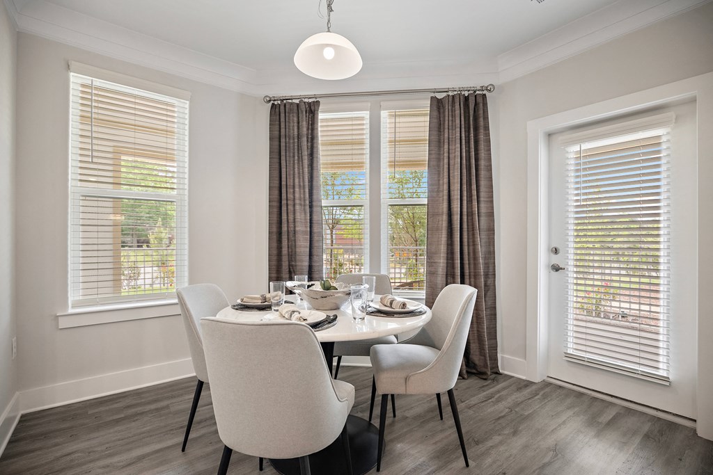 an image of a dining room with a table and chairs at Ellis Station, Durham, NC