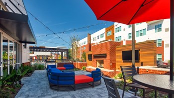 Outdoor seating at Ellipse Urban Apartments in Hampton VA Outdoor seating at Ellipse Urban Apartments in Hampton VA - Photo Gallery 4