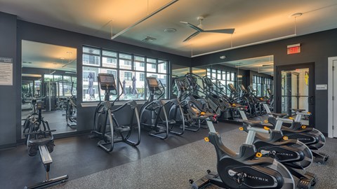 a gym with cardio bikes and other exercise equipment at Allure at Edinburgh, Chesapeake, 23322