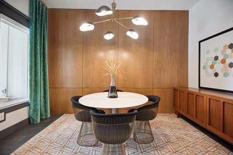 a dining room with a table and chairs at Shellbrook, Raleigh, North Carolina