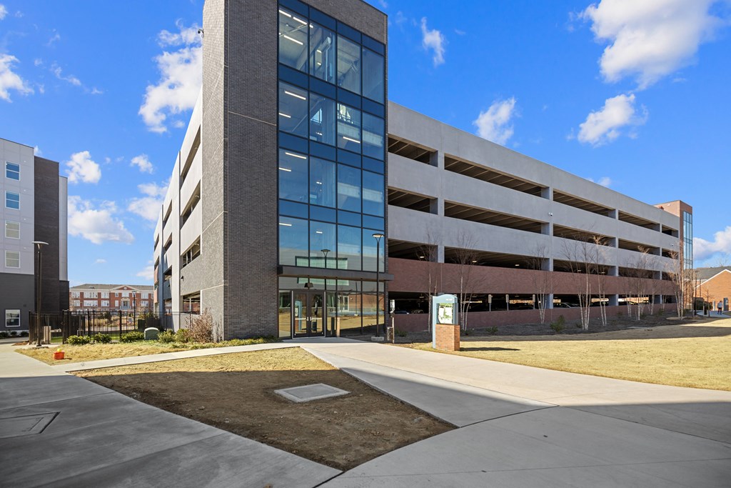 an office building with large glass windows and a sidewalkat Centro at Pine Nash, North Carolina