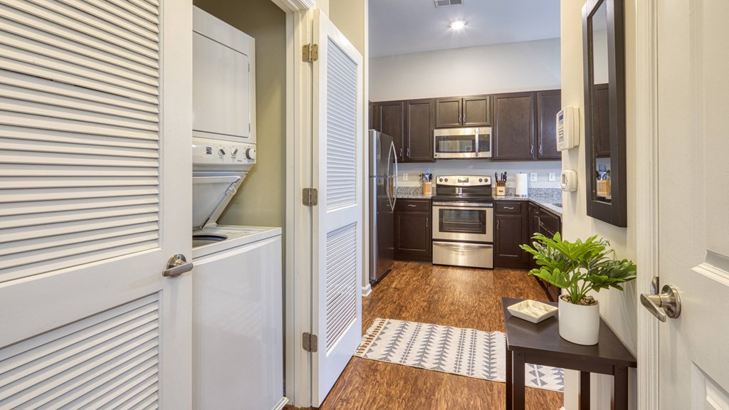 the view of a kitchen from an open door