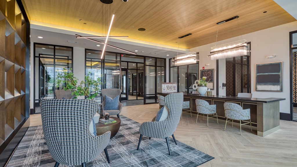 the preserve at cardinal woods lobby with chairs and tables at Aura Stonebridge, Richmond, VA 23225