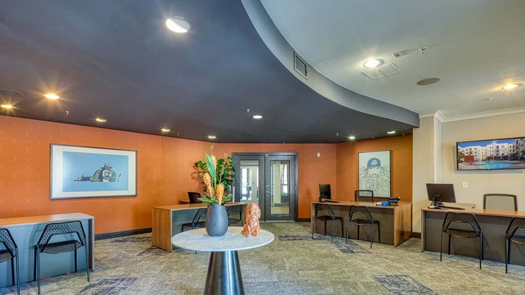 leasing office with desks and seating areas at Proximity at ODU, Norfolk, Virginia