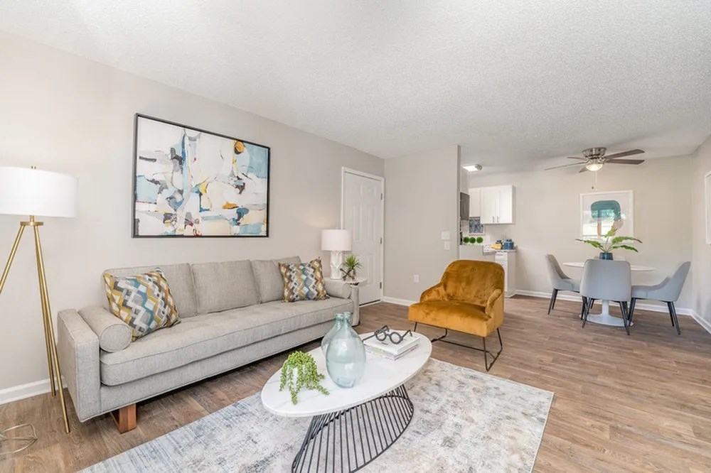 a living room with a couch and a table at Village 1373, North Carolina, 27455