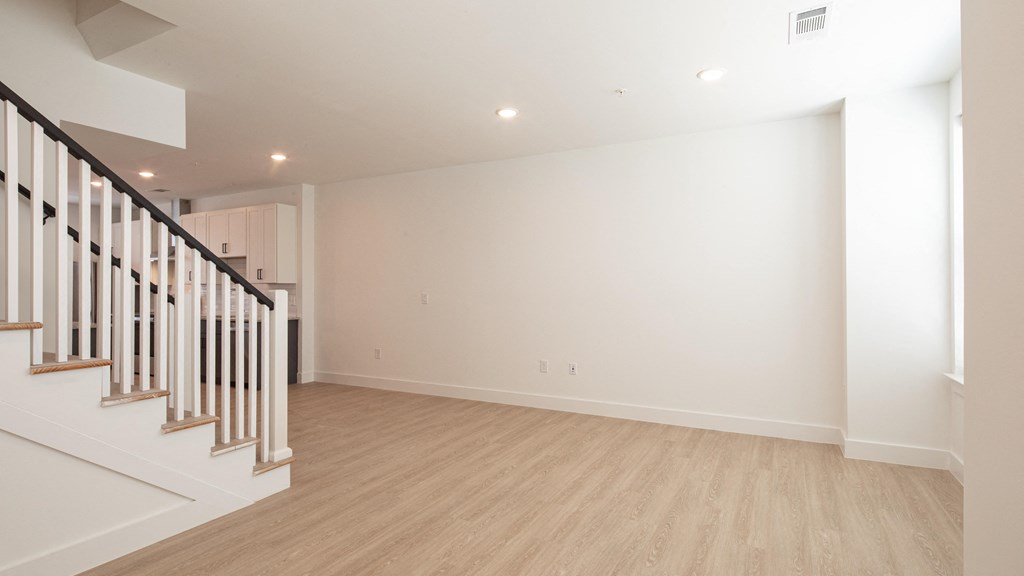 a bedroom with a staircase in a 555 waverly unit at Ainsworth, Richmond, 23228