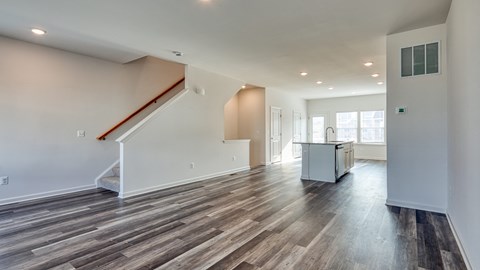 Spacious Living Room with wooden flooring at The Mark Townhomes Apartments, Virginia