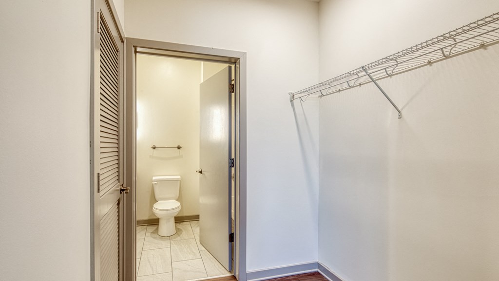 a bathroom with a shower and a toilet in it