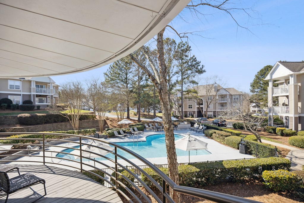 the preserve at ballantyne commons pool and patio area with apartment buildings
